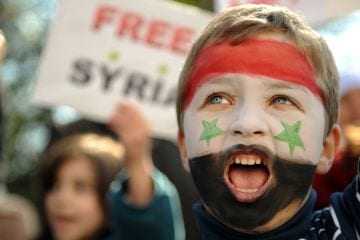 Thousands Rally in Support of Syrian President