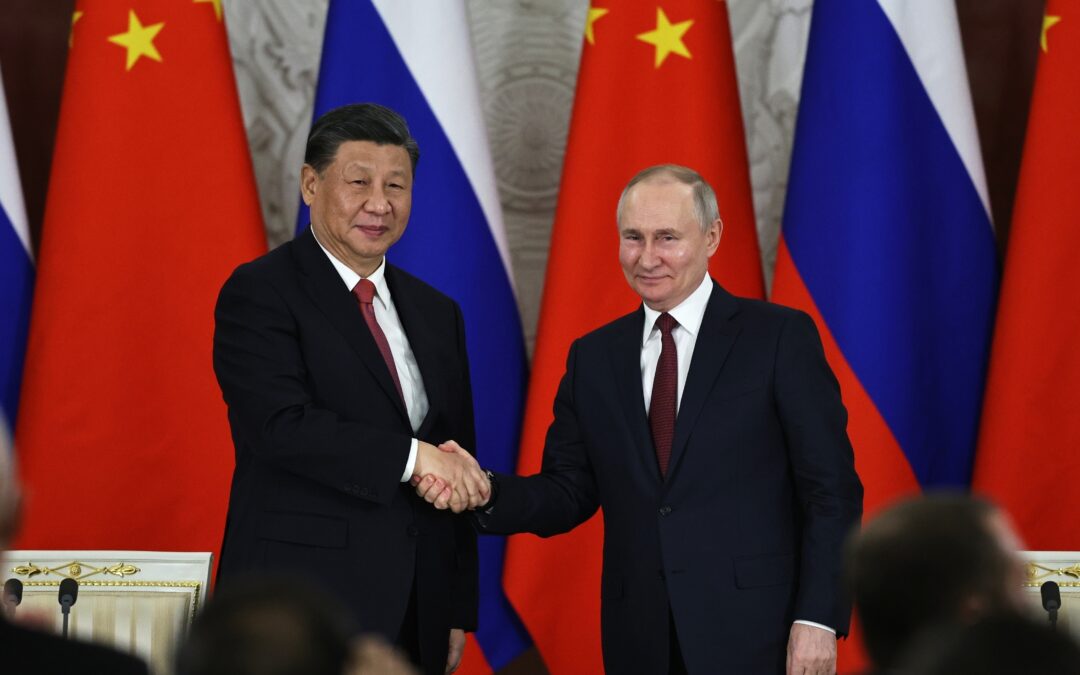On the eve of his visit to China, Putin says Russia is prepared to negotiate over Ukraine